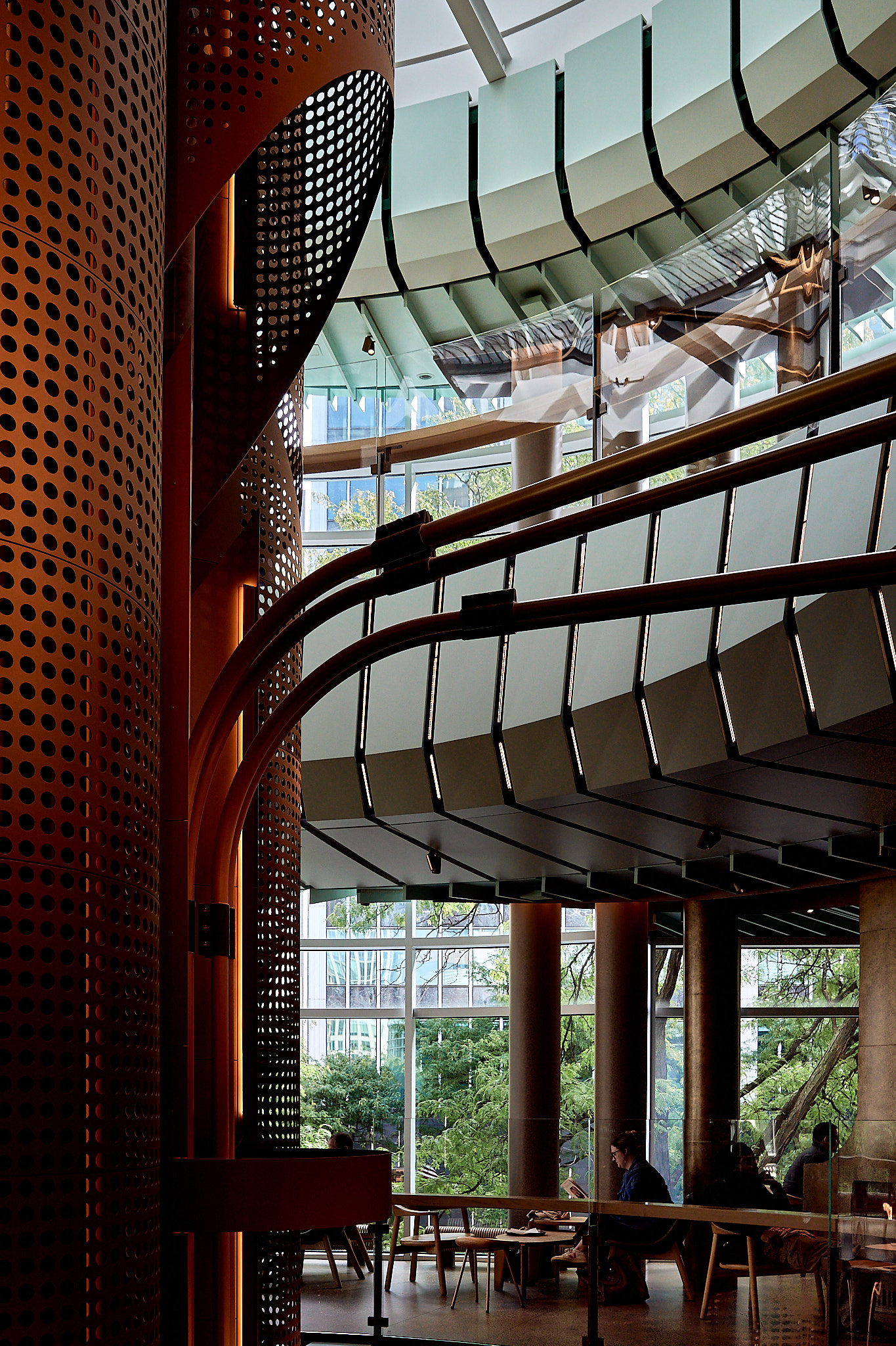 The airy upper floor with its copper wall and wooden furniture