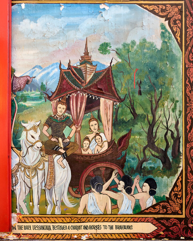 A mural from the Vessantara Jataka showing Prince Vessantara giving away his horses and chariot